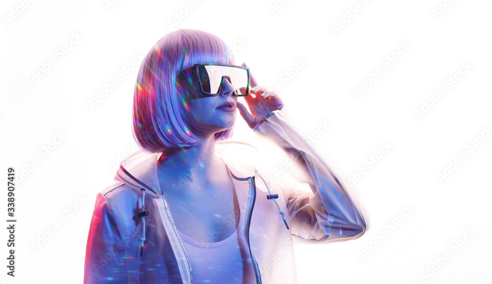 Beautiful woman with purple hair in futuristic costume over white background. Girl in stylish glasses. Free space for text. Beautiful woman with purple hair in futuristic costume over white background. Girl in stylish glasses. Free space for text.