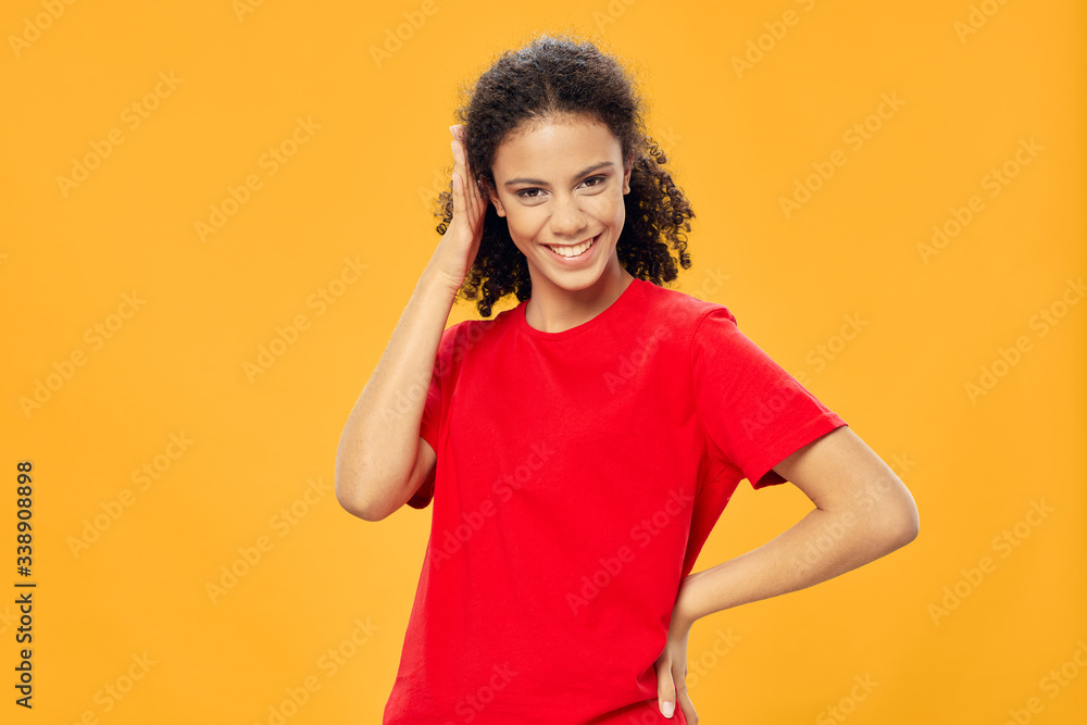 Cheerful woman curly hair charm lifestyle studio isolated background smile model Cheerful woman curly hair charm lifestyle studio isolated background smile model