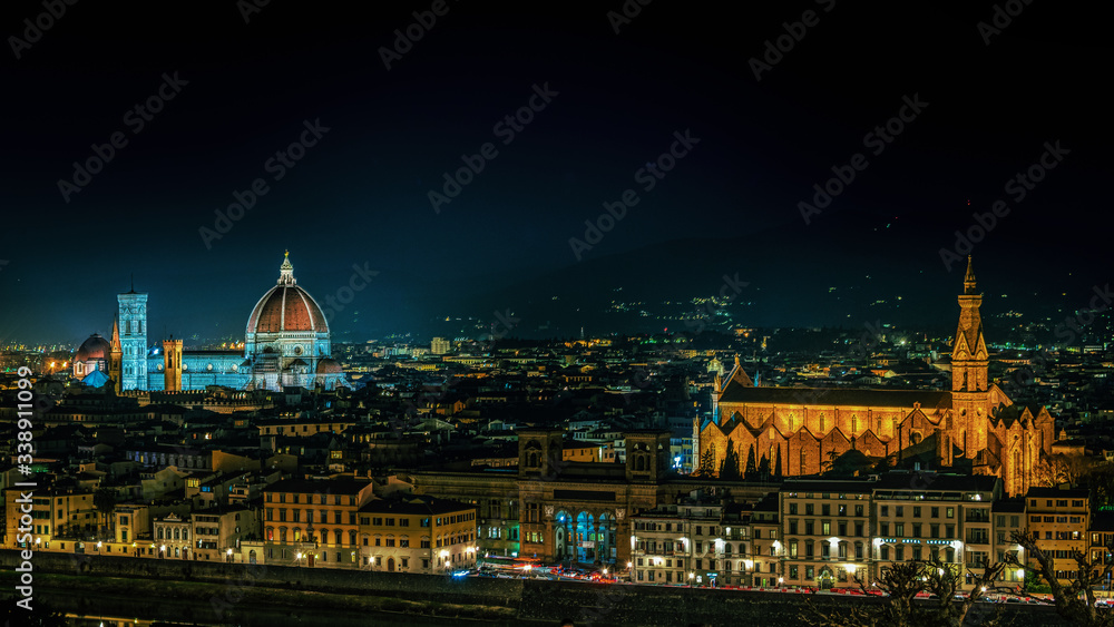 Florence by night the beautiful city with the landmark and famous duomo and the church 