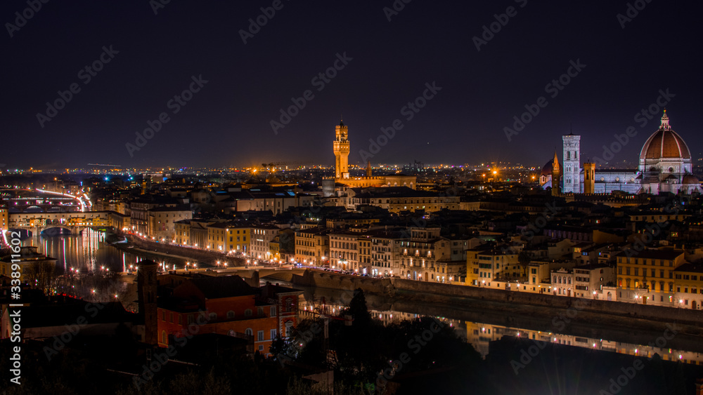 Florence by night the beautiful city with the landmark and famous duomo and the ponte vecchio