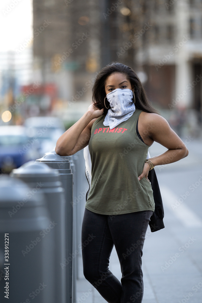 African American woman model wearing bandana face mask during coronavirus pandemic