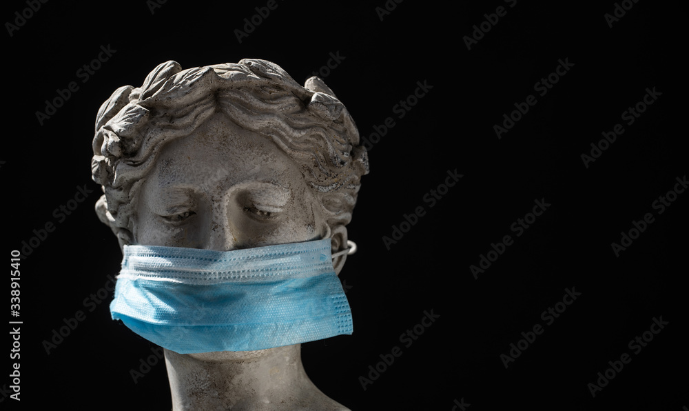 Italian statue in protective blue mask
