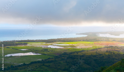 Coastal Caribbean landscape at rainy sunny morning © evannovostro