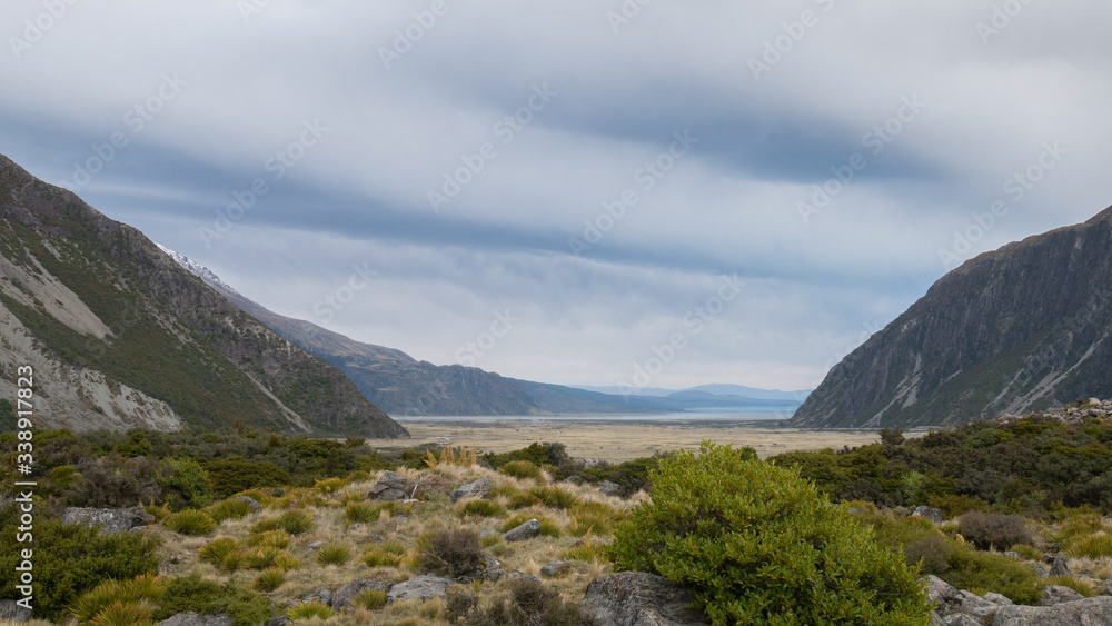 Vista on alpine valley with cloudy skies. Shot at Aoraki/Mt Cook National Park, New Zealand Vista on alpine valley with cloudy skies. Shot at Aoraki/Mt Cook National Park, New Zealand