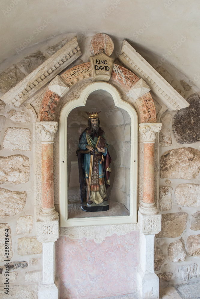 Bethlehem, Palestinian Authority, January 28, 2020: The statue of King David stands in a niche at the entrance to the grotto of the Milk Grotto Church in Bethlehem