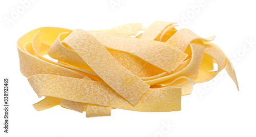 Raw pasta, pappardelle isolated on white background, clipping path photo