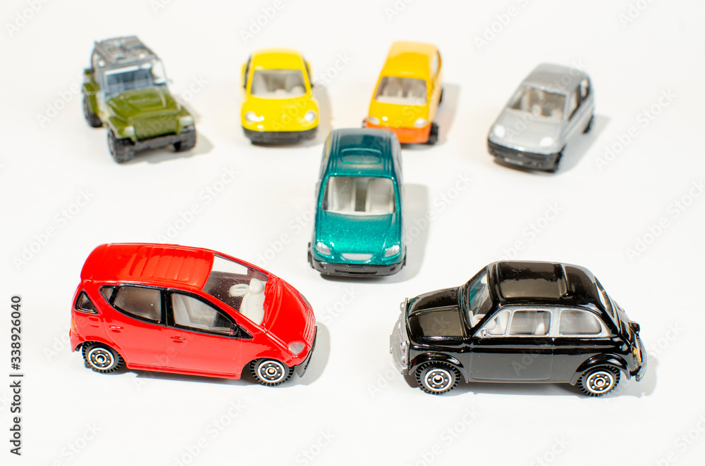 children`s metal cars on a white background