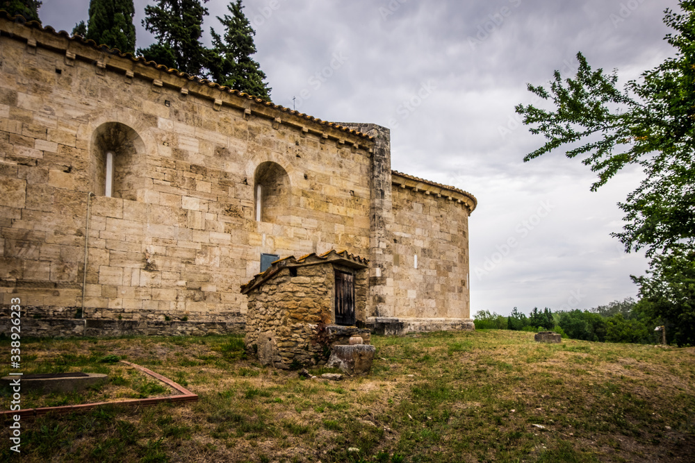 Santa Maria de Porqueres romanic church in Lake of Banyoles, Catalonia, Spain.