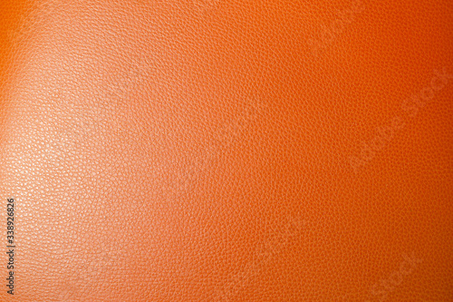 Texture of a orange leather background.