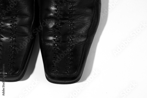 black men shoes closeup on white background - stock photo