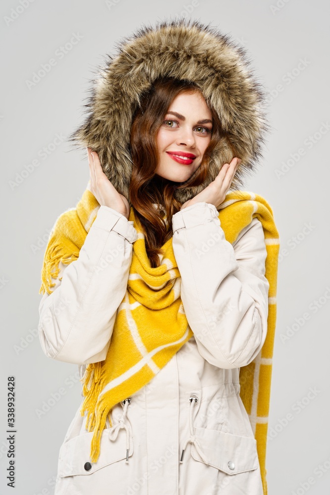 Beautiful charm woman winter jacket hood smile model