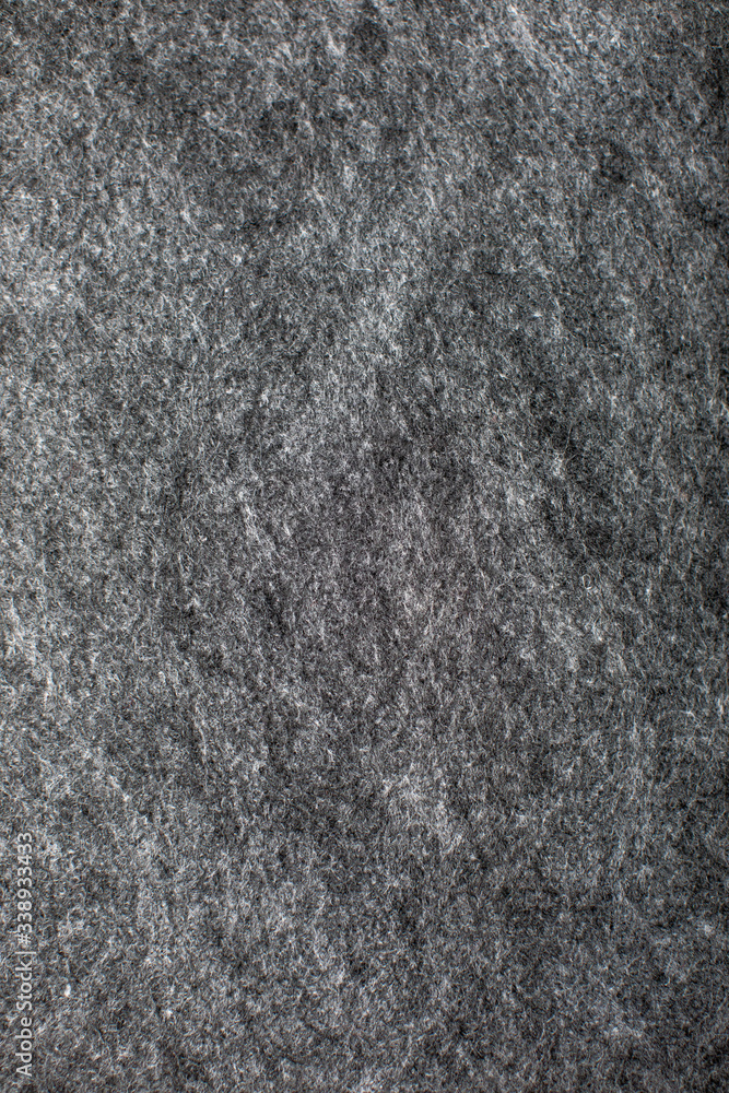Fototapeta premium Vertical texture of gray wool fabric background