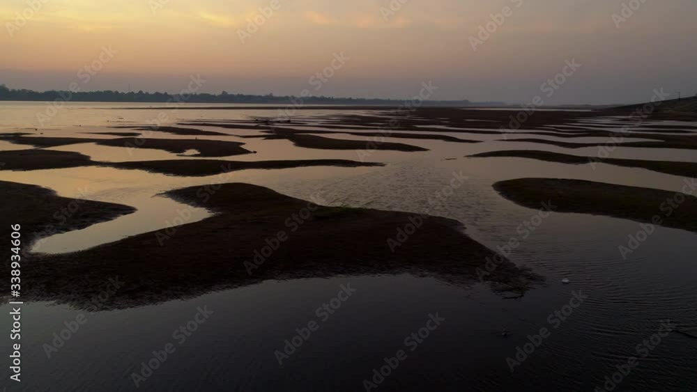 Drone shot sunrise sunset view Mekong river and sandbanks in the Mekong river. Drone shot sunrise sunset view Mekong river and sandbanks in the Mekong river.