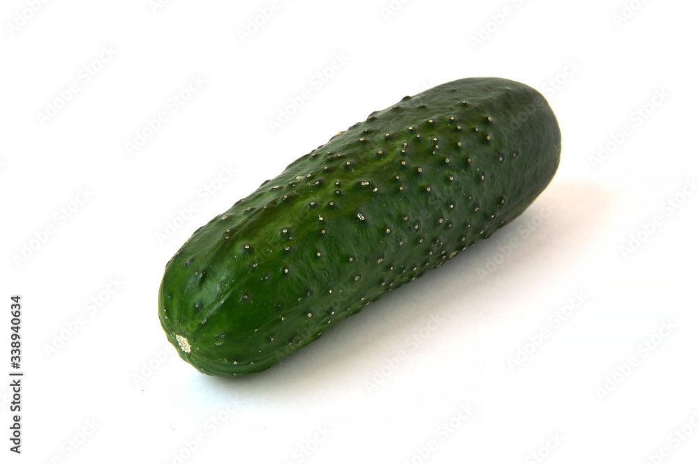 Green cucumber on a white background. Beautiful food Green cucumber on a white background. Beautiful food