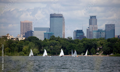 Sailing regatta on Lake Calhoun with downtown Minneapolis as a backdrop. Minneapolis Minnesota MN USA