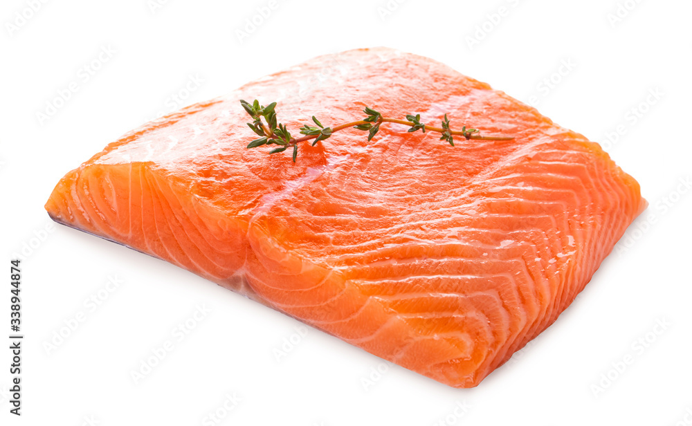 Fresh raw salmon filet with thyme sprig