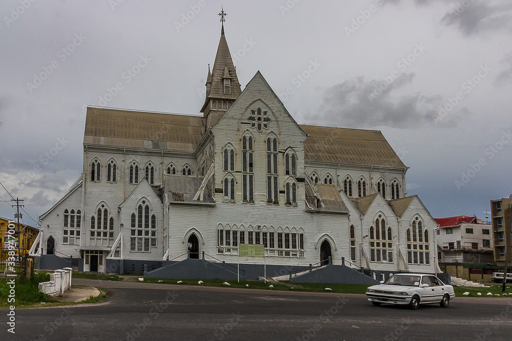 Obraz premium View of the old wooden cathedral of St. George's Cathedral Anglican Church in Georgetown, the capital of Guyana.