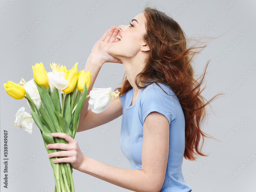 Cheerful woman bouquet of flowers gift womens day spring