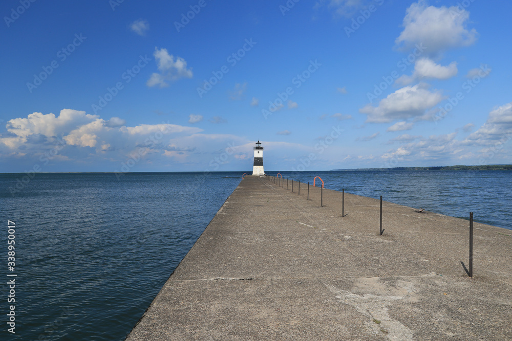 Erie Harbor Pierhead Lighthouse pier Pennsylvania. Isle North Pierhead Lighthouse on shore of Lake Erie in Pennsylvania. Built in 1800's. Nautical navigation historical building. Erie Harbor Pierhead Lighthouse pier Pennsylvania. Isle North Pierhead Lighthouse on shore of Lake Erie in Pennsylvania. Built in 1800's. Nautical navigation historical building.
