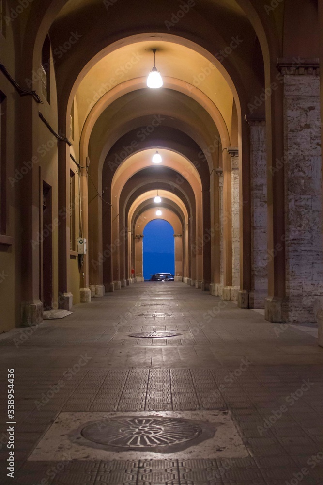 Night view of an historic porch in the cityof Perugia, Italy