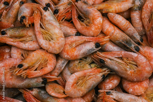 Cooked shrimp close-up. Fresh seafood. Shrimp background. Top view, flat lay.