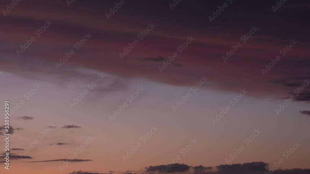 clouds floating in the sky at sunset clouds floating in the sky at sunset