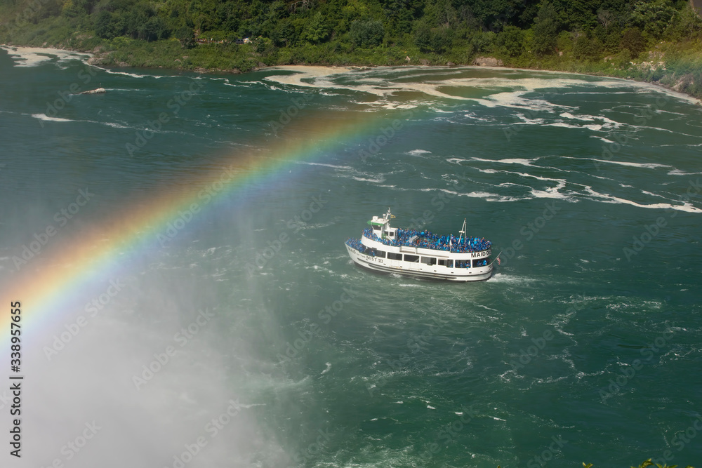 Obraz premium Niagara Falls Maid of the Mist New York tour rainbow. Waterfalls at the border of US state of New York and Canadian province of Ontario. Drains Lake Erie into Lake Ontario. 