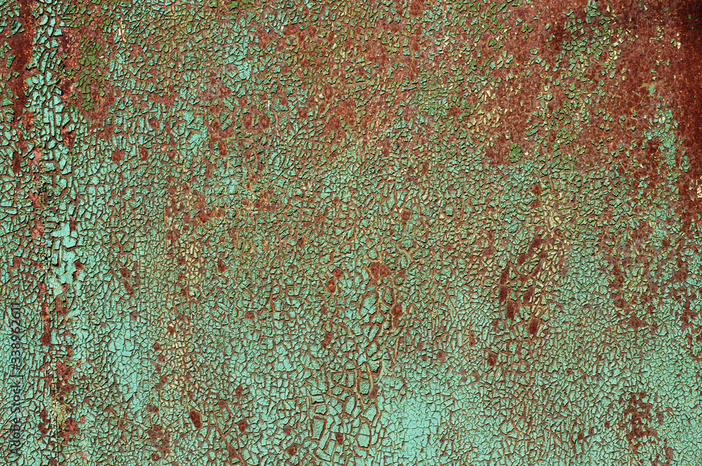 Texture with covered paint. Green background with rust