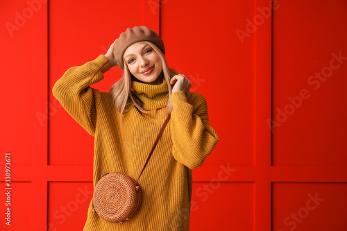 Young woman in warm sweater...