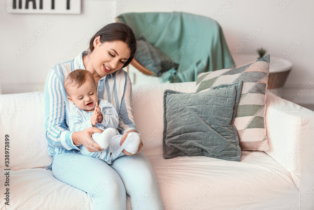 Happy mother with cute little baby at home Happy mother with cute little baby at home