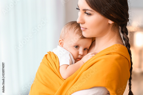 Happy mother with cute litt...