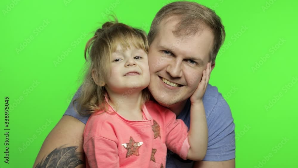 Father and little daughter hugging each other. Chroma Key. Fathers day Father and little daughter hugging each other. Chroma Key. Fathers day