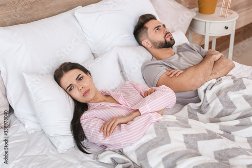 Sad couple after quarrel in...