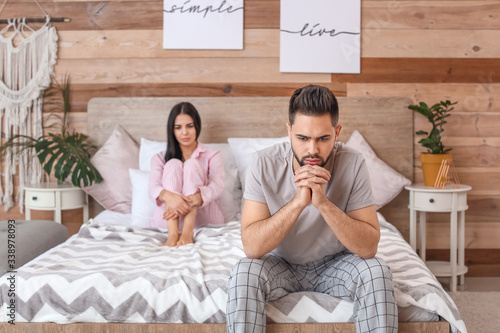 Sad couple after quarrel in...