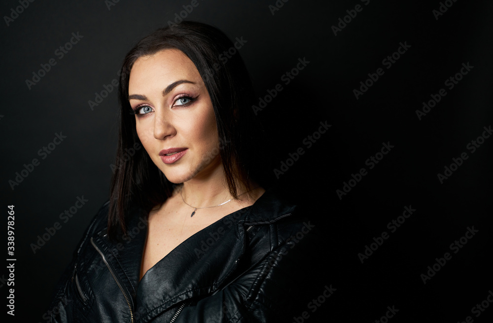 Beautiful Black hair woman beautiful portrait. Hairstyle curly hair beauty female model girl over dark background Beautiful Black hair woman beautiful portrait. Hairstyle curly hair beauty female model girl over dark background