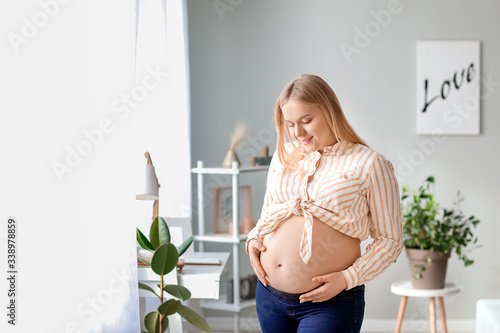 Beautiful pregnant woman at...