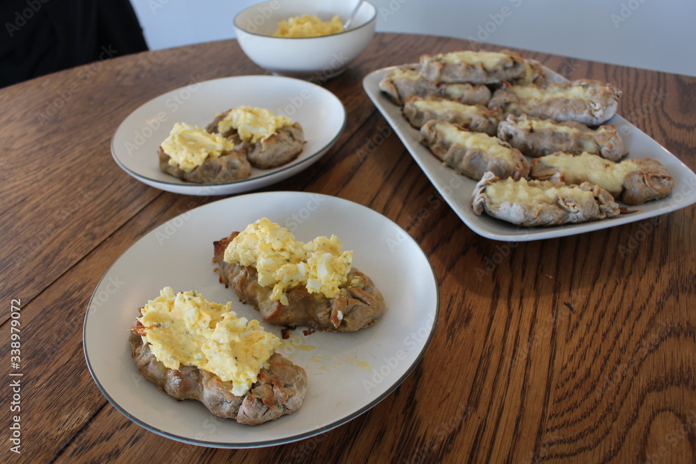 Close up view on freshly baked Karelian Pie with egg butter, a traditional topping to this dish in Finland Close up view on freshly baked Karelian Pie with egg butter, a traditional topping to this dish in Finland