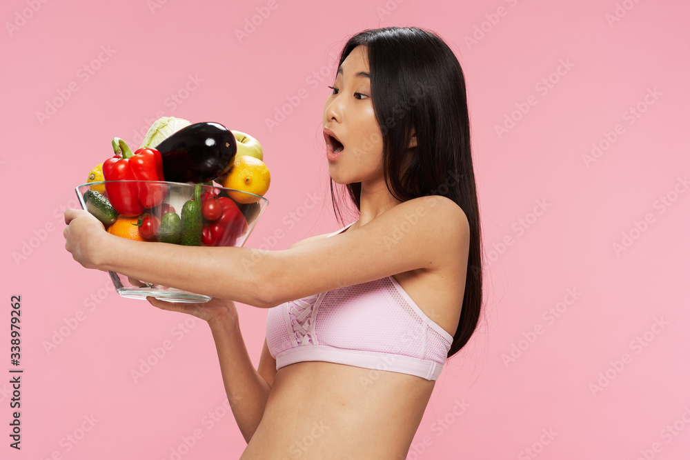 woman with basket of vegetables woman with basket of vegetables