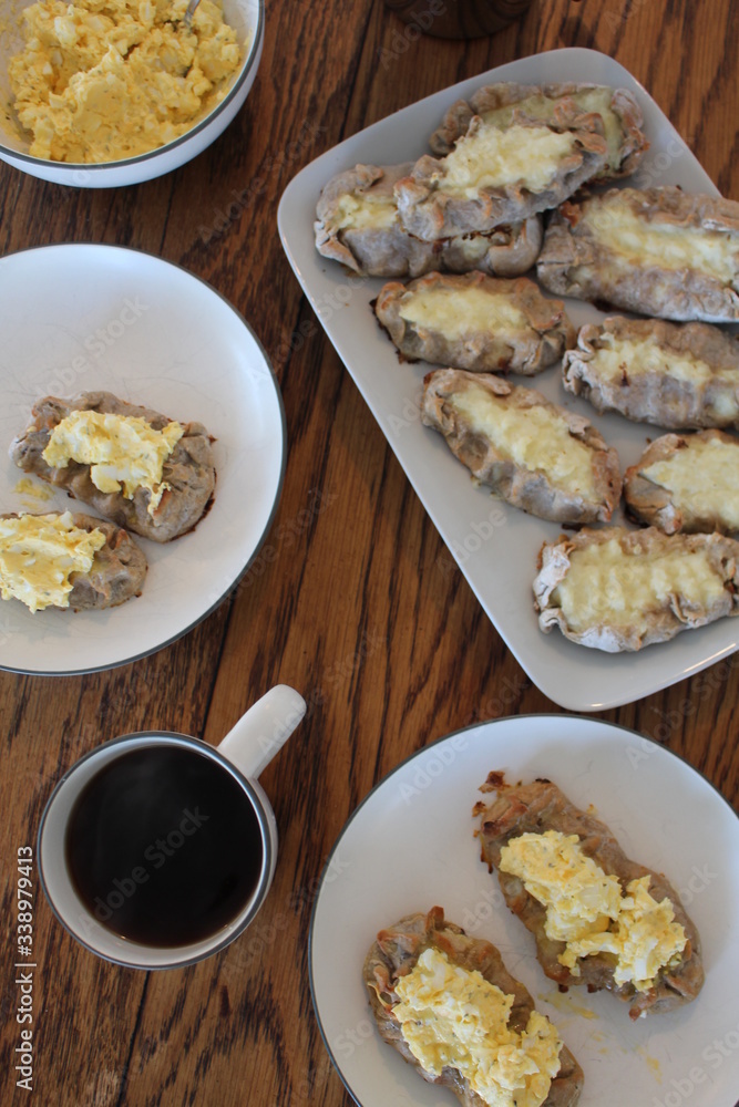 Close up view on freshly baked Karelian Pie with egg butter, a traditional topping to this dish in Finland Close up view on freshly baked Karelian Pie with egg butter, a traditional topping to this dish in Finland