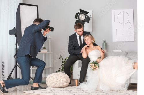 Photographer working with y...