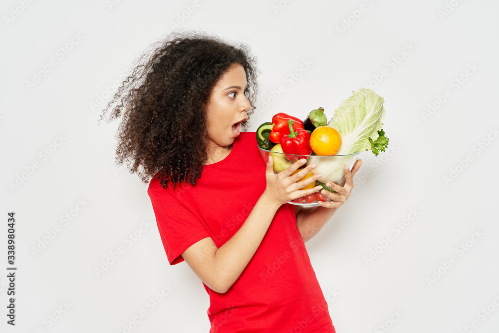 young woman holding an apple young woman holding an apple