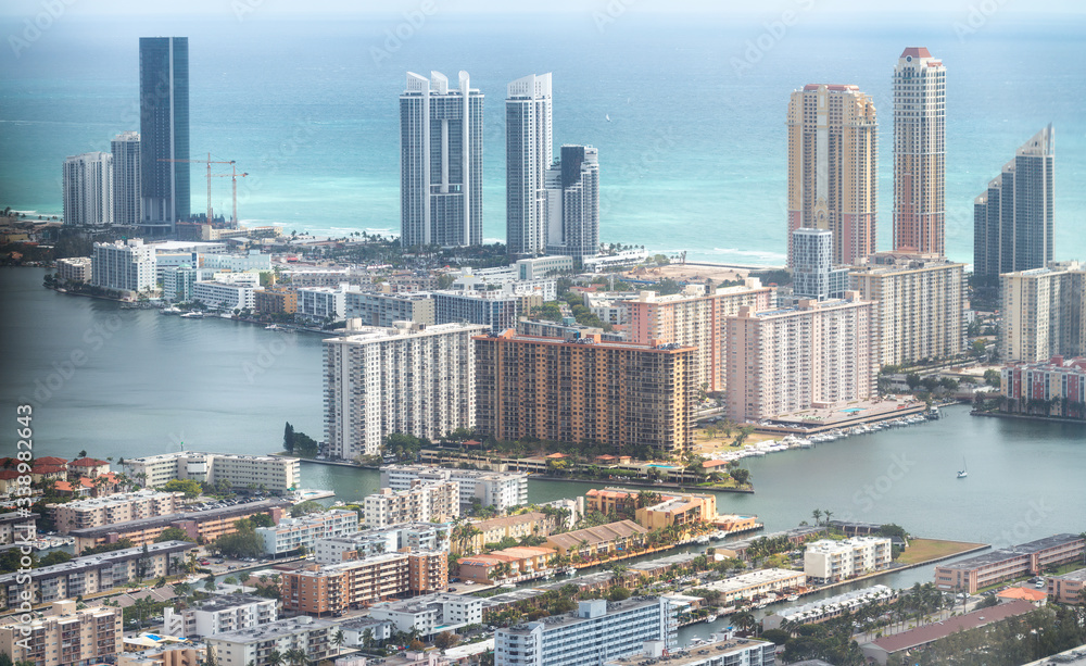 Obraz premium North Miami Beach skyscrapers, aerial view from helicopter