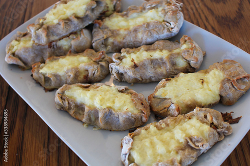 Close up view on freshly baked Karelian Pie with egg butter, a traditional topping to this dish in Finland