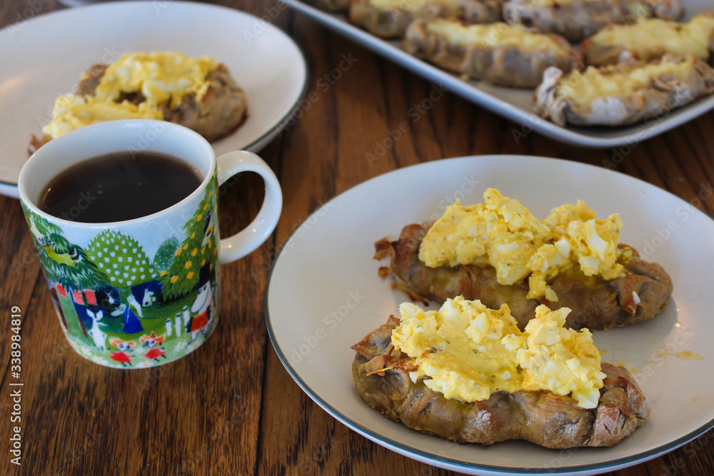 
Traditional Finnish Karelian pies and a cup of black coffee.