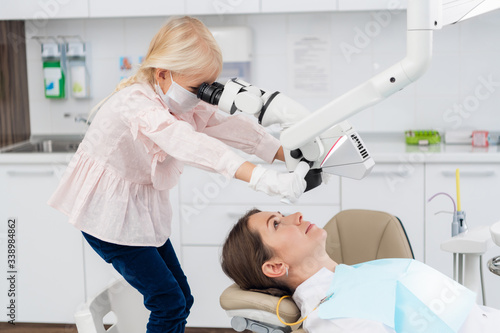 Kid at a clinic, Little doctor, playing dentistry