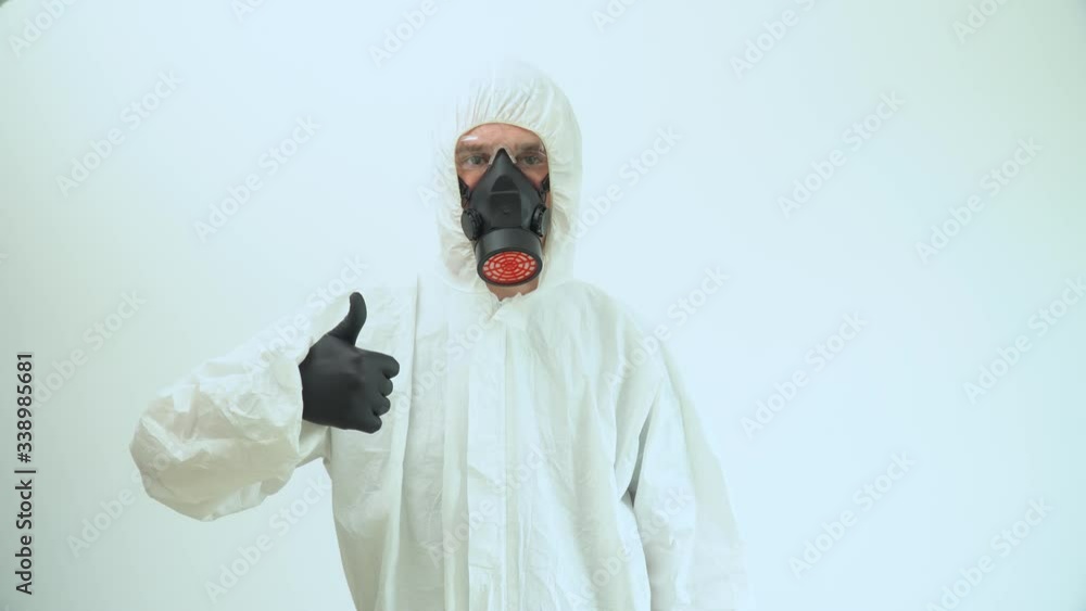 Portrait of a virologist in protective coverall and black respirator Portrait of a virologist in protective coverall and black respirator