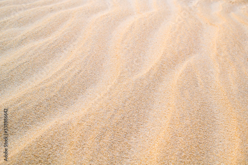 Patterns in the clear sand. Purity concept