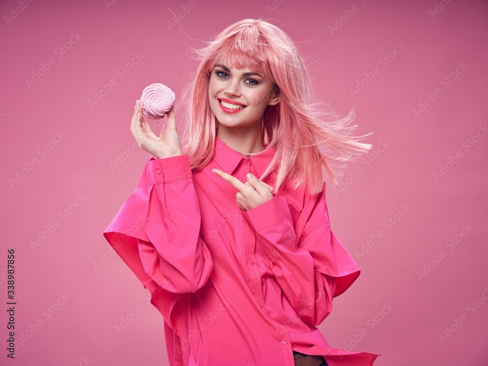 Cheerful beautiful woman charm pink hair cake enjoyment smile Cheerful beautiful woman charm pink hair cake enjoyment smile