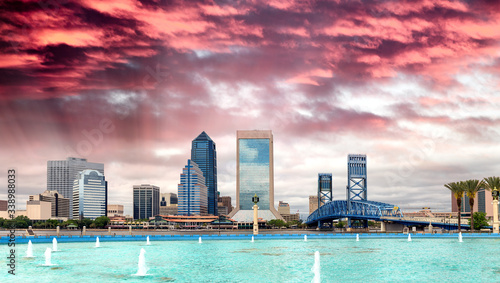 Jacksonville, Florida. Panoramic view of city downtown and brigde at dusk, USA