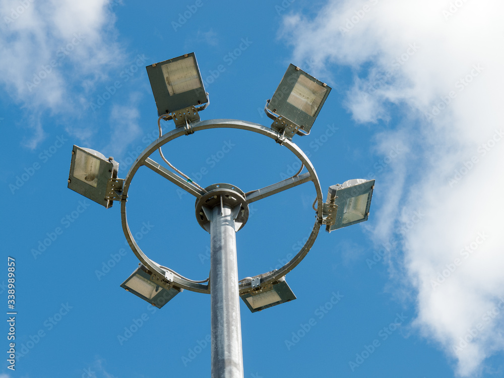 led urban lighting lamp on a pole against the blue sky, eco-friendly energy-saving technology in the urban environment led urban lighting lamp on a pole against the blue sky, eco-friendly energy-saving technology in the urban environment
